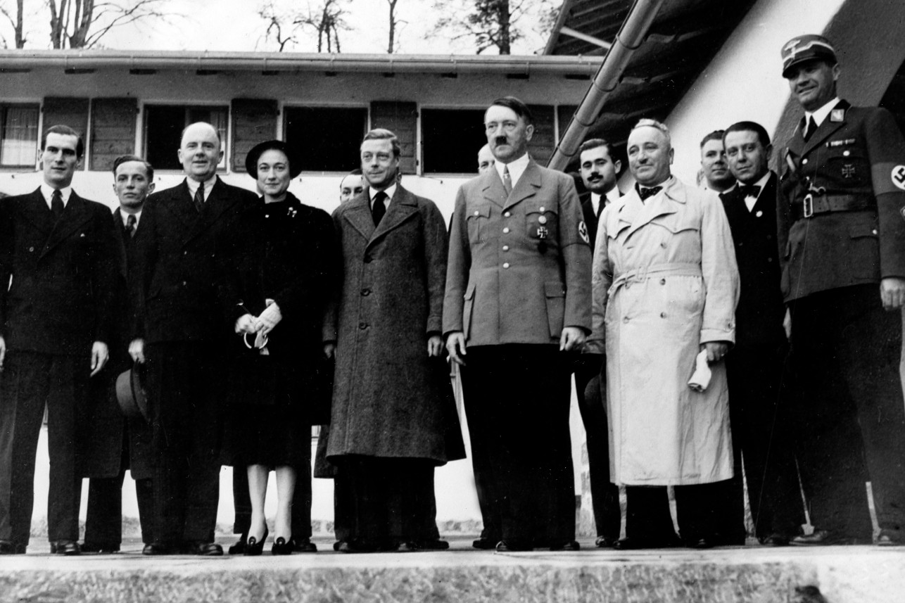 Adolf Hitler with the Duke and Duchess of Windsor pose in front of the stairs of the Berghof